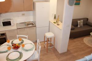 Kuchyň nebo kuchyňský kout v ubytování Apartments Platana