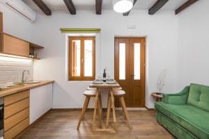Posezení v ubytování Evlimeni Suites