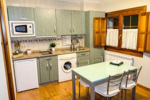 Fotografie z fotogalerie ubytování Apartamentos Turísticos Casa Pilar v destinaci Nueva de Llanes + 15 fotografií