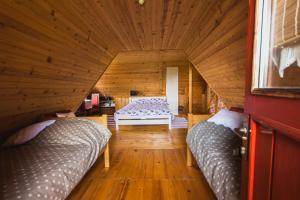 A bed or beds in a room at Challet Bella