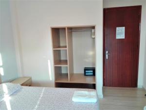 Posteľ alebo postele v izbe v ubytovaní Dinos Green Place