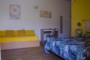 Postel nebo postele na pokoji v ubytování Baia Benessere B&B Eco Vegan