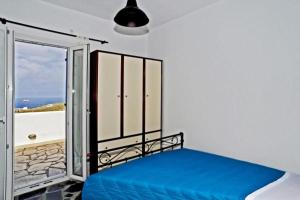 Postel nebo postele na pokoji v ubytování The Sunrise Villa