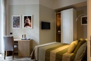 TV a/nebo společenská místnost v ubytování 50 SUITE Guesthouse