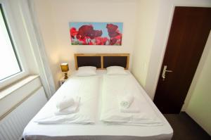 Letto o letti in una camera di Appartement THE GOOD VIEW by All in One Apartments