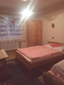 Кровать или кровати в номере U Pauli i Eryka