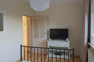 TV a/nebo společenská místnost v ubytování Apartament Turkus