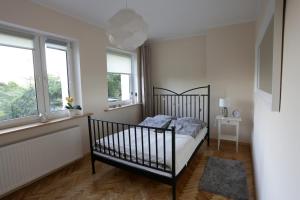 Postel nebo postele na pokoji v ubytování Apartament Turkus