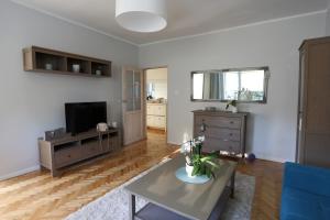 TV a/nebo společenská místnost v ubytování Apartament Turkus