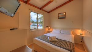 Ein Bett oder Betten in einem Zimmer der Unterkunft Yarrawonga Holiday Park