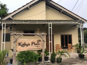 a house with a sign that reads kings place at Kathy’s Place in Karimunjawa