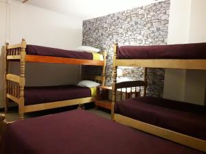 Dviaukštė lova arba lovos apgyvendinimo įstaigoje Hostal Torres del Paine 2