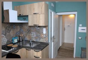 Kuchyň nebo kuchyňský kout v ubytování B&b Slow life