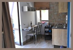 Kuchyň nebo kuchyňský kout v ubytování B&b Slow life