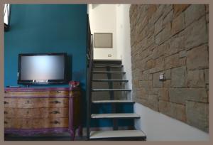 TV a/nebo společenská místnost v ubytování B&b Slow life