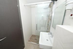 Koupelna v ubytování Hotel Delfin
