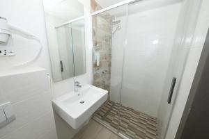 Koupelna v ubytování Hotel Delfin