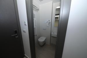 Koupelna v ubytování Hotel Delfin