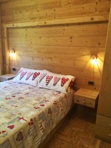 Postel nebo postele na pokoji v ubytování Romantiche Orobie B&B