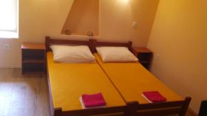 Postel nebo postele na pokoji v ubytování apartman željana