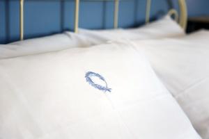 A bed or beds in a room at Aigeis-milos