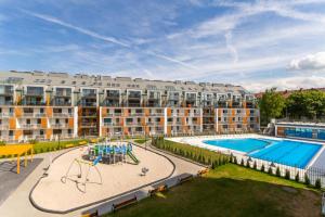 Bazén v ubytovaní Feniks SPA Apartments 10 by Jantar Apartamenty Kołobrzeg alebo v jeho blízkosti