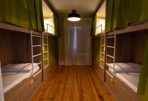 Cama ou camas em um quarto em VisHostel