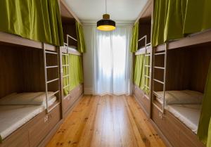 Cama ou camas em um quarto em VisHostel