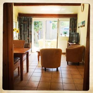 TV a/nebo společenská místnost v ubytování De Munnik + 22 fotografií