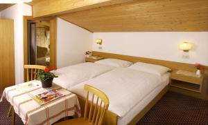 Tempat tidur dalam kamar di Muller Private Rooms