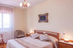 A bed or beds in a room at Casa Pauli