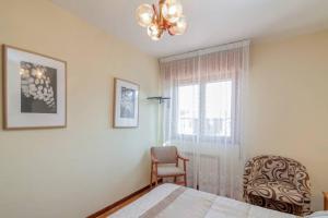 A bed or beds in a room at Casa Pauli