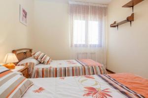 A bed or beds in a room at Casa Pauli