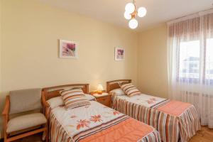 A bed or beds in a room at Casa Pauli
