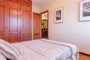 A bed or beds in a room at Casa Pauli
