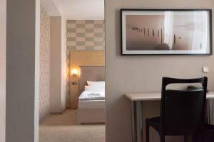 Postel nebo postele na pokoji v ubytování Hotel Engel