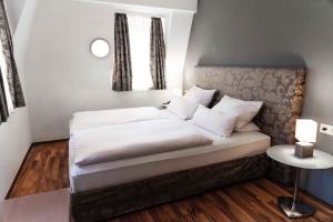 Postel nebo postele na pokoji v ubytování Hotel Engel