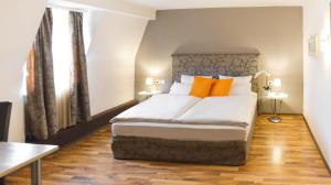 Postel nebo postele na pokoji v ubytování Hotel Engel