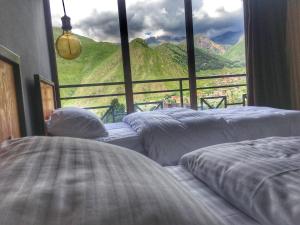 Postelja oz. postelje v sobi nastanitve Chemodann Kazbegi