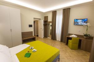 Posteľ alebo postele v izbe v ubytovaní Le Affacciate Bruzie Home Guest House