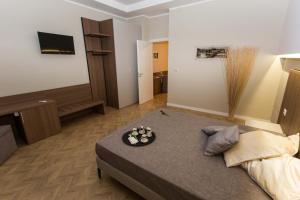 Postel nebo postele na pokoji v ubytování Le Affacciate Bruzie Home Guest House