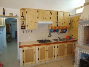 Cucina o angolo cottura di Bilocale a 15km da Gallipoli