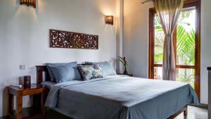 Letto o letti in una camera di Good Karma