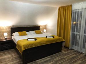 Postel nebo postele na pokoji v ubytování Villa Rustica