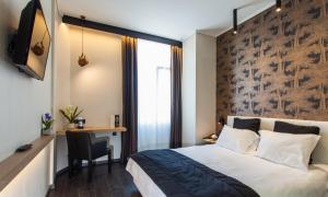 Posteľ alebo postele v izbe v ubytovaní Egnatia Palace Hotel & Spa