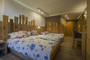 Ein Bett oder Betten in einem Zimmer der Unterkunft Hotel Negritella
