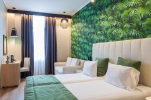 Posteľ alebo postele v izbe v ubytovaní Egnatia Palace Hotel & Spa