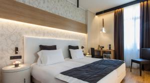 Posteľ alebo postele v izbe v ubytovaní Egnatia Palace Hotel & Spa