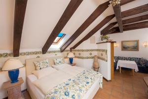 מיטה או מיטות בחדר ב-Romantik Villa