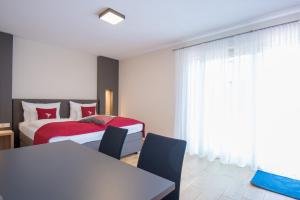 Posteľ alebo postele v izbe v ubytovaní Hotel dasMEI